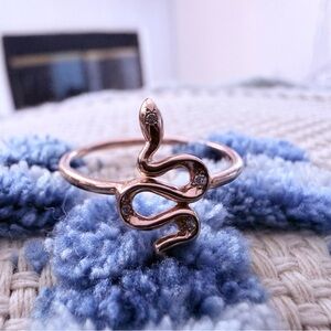 Logan Hollowell Rose Gold Kundalini Baby Snake Ring with 4 small inlaid diamonds